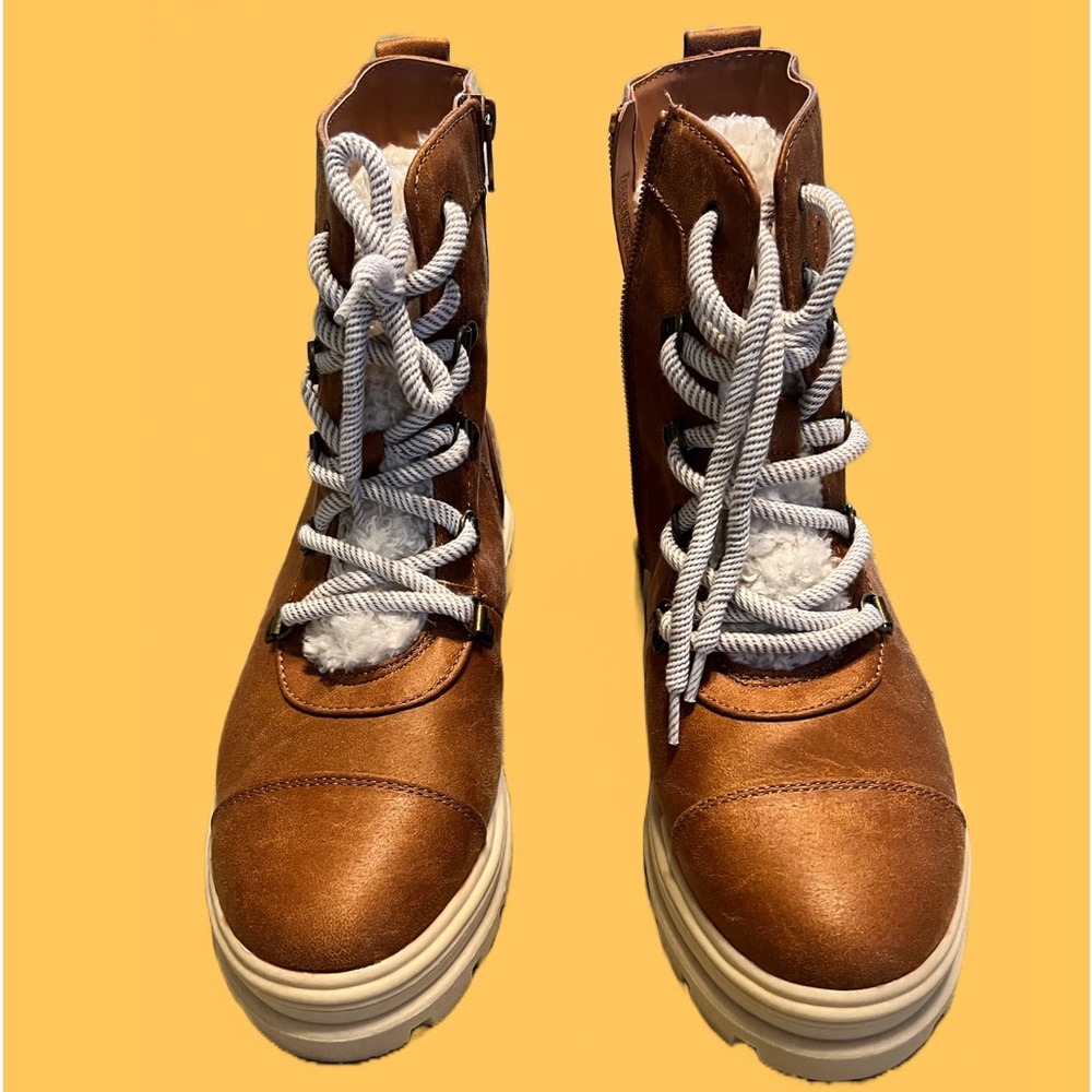 Never worn stylish Art Class boots with faux fur just in time for winter!